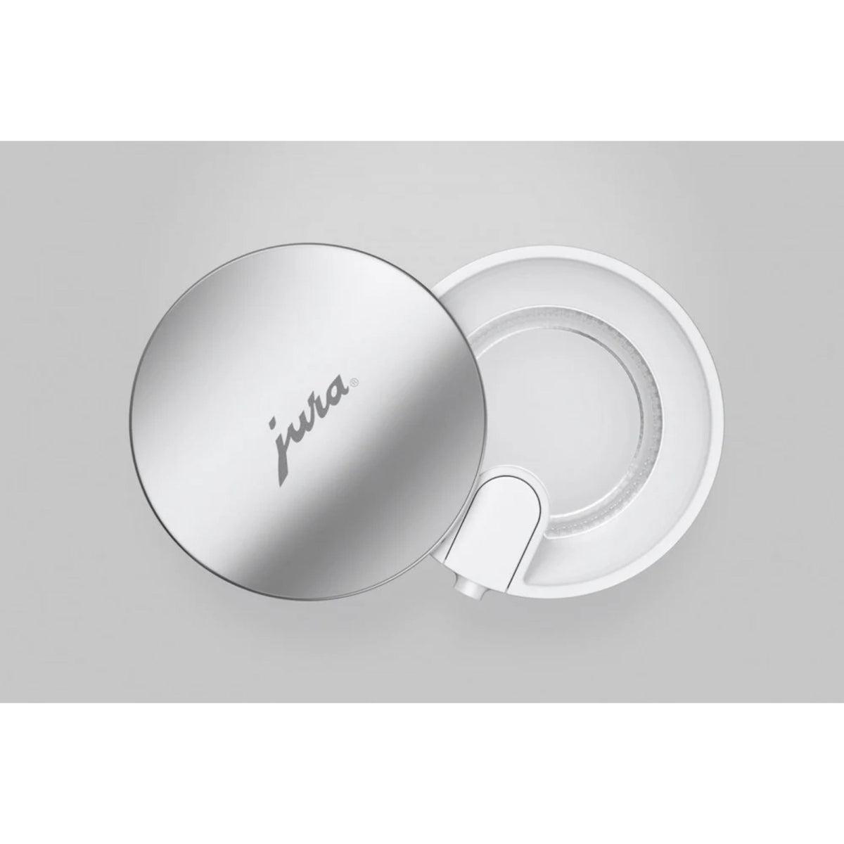 JURA Milk container EA (24313) – silver lid with 'jura' lettering and white inner container with spout, top view