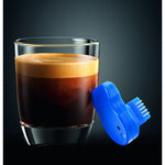 JURA Smart Connect module (72167) blue module with connectors next to an espresso glass with crema