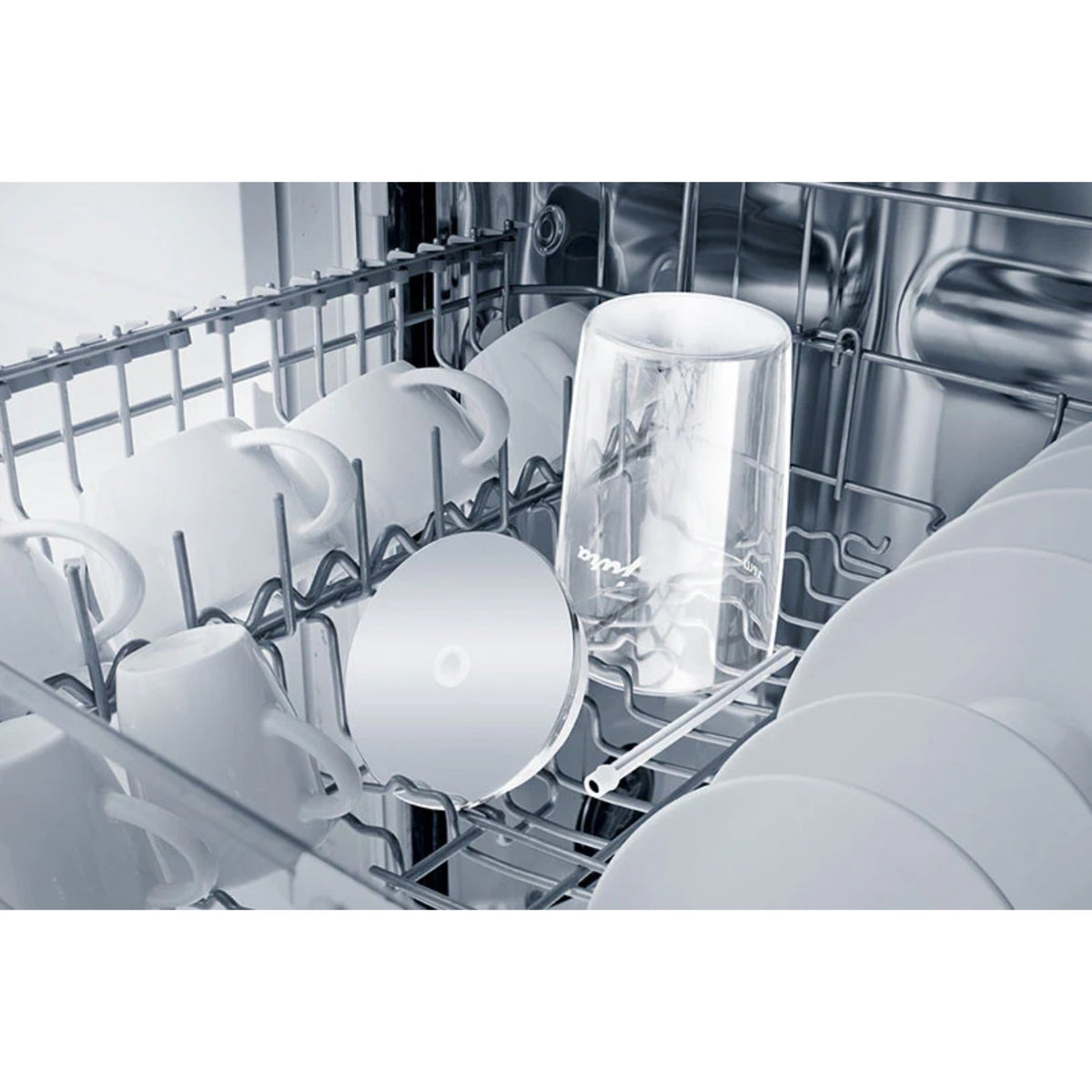 JURA Glass milk container (72570) in dishwasher rack among cups and plates, transparent jar with lid and tube