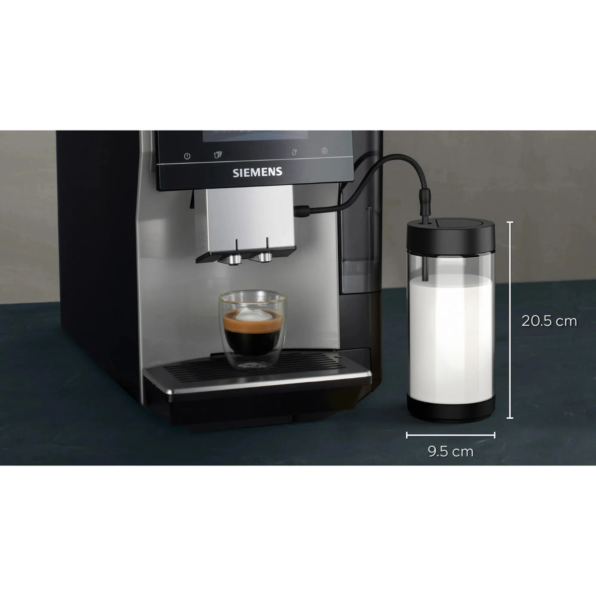 Siemens Glass milk container 0.7 l (TZ80008) next to a coffee machine, transparent glass container with black lid and connector.